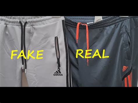 fake adidas track pants|adidas track pants and boots.